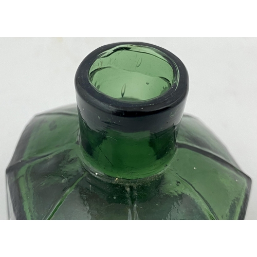 53 - OCTAGONAL INK BOTTLE. 2.2ins tall. Squat tooled lip, deep green glass, unusual delineated shoulders.... 