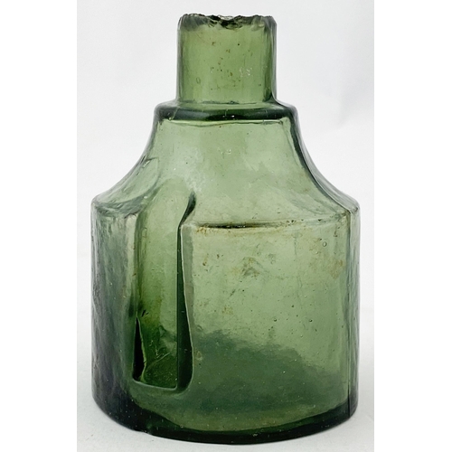 56 - COLOURED GLASS F M & Co INK BOTTLE. 2.4ins tall, burst lip. Smokey mid olive green glass - hard to f... 