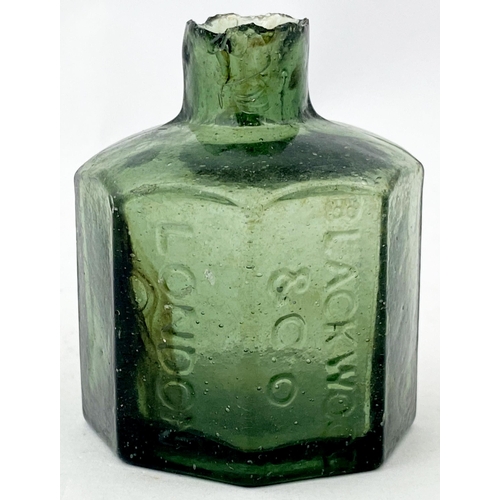 57 - BLACKWOOD & CO INK BOTTLE. 2.2ins tall. A hard to find olive green glass London octagonal. Mid olive... 