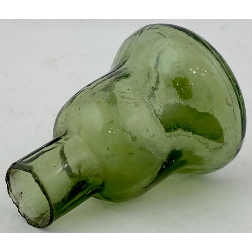 58 - BELL SHAPE GUM BOTTLE. 2.4ins tall. Classic bell shape, burst lip. Very rare mid olive green coloure... 