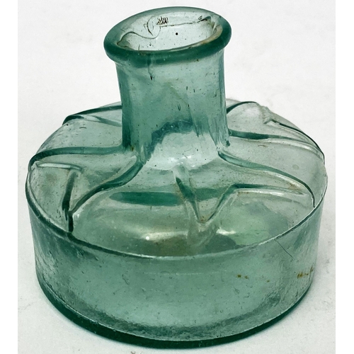 59 - MALTESE CROSS INK BOTTLE. 2ins tall. Bluey aqua, crude tooled lip. Shoulders draped with four forked... 