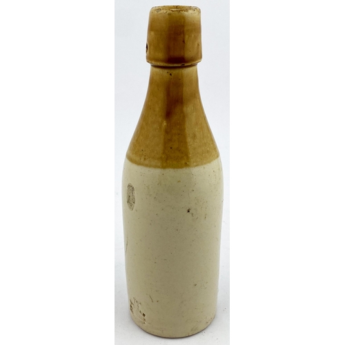 95 - HAWICK GINGER BEER BOTTLE. 8.3ins tall. T.t, ch., swing stopper type. Very ornate transfer CRAIGS ST... 