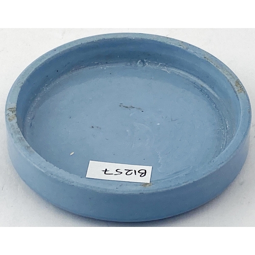 124 - CARBOLINE POT LID. 3.15ins diam. Mid blue coloured pot lid with black transfer featuring decorative ... 