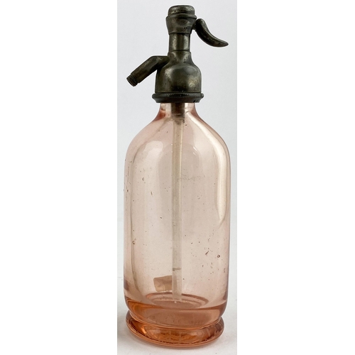 142 - BRITISH SYPHON CO MINIATURE SODA SYPHON. 6.4ins tall, dull pewter top, salmon pink glass. Base acid ... 