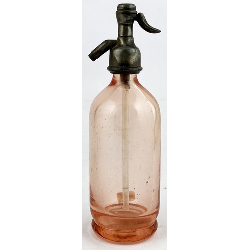 142 - BRITISH SYPHON CO MINIATURE SODA SYPHON. 6.4ins tall, dull pewter top, salmon pink glass. Base acid ... 