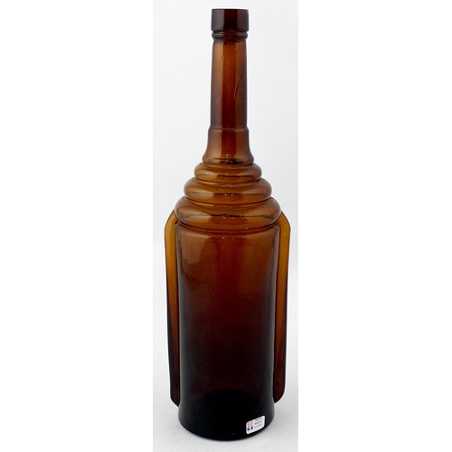 156 - GIANT KOOSH BITTERS. 12.2ins tall. Distinctive tall circular bottle, long thin neck, protruding ribs... 