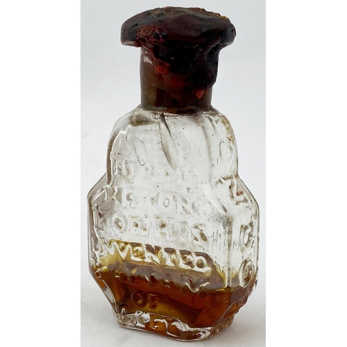 163 - ROBERT TURLINGTONS BALSAM OF LIFE BOTTLE. 2.6ins tall, lead glass. THE/ KINGS/ ROYALL/ PATENT/ GRANT... 