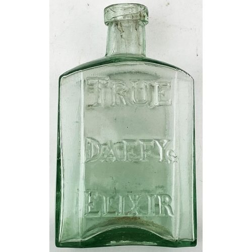 164 - SPLIT SIZE DAFFYS ELIXIR BOTTLE. 4.5ins tall. Light aqua glass half size early medicine, rectangular... 