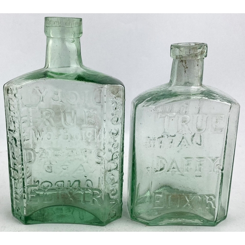 164 - SPLIT SIZE DAFFYS ELIXIR BOTTLE. 4.5ins tall. Light aqua glass half size early medicine, rectangular... 