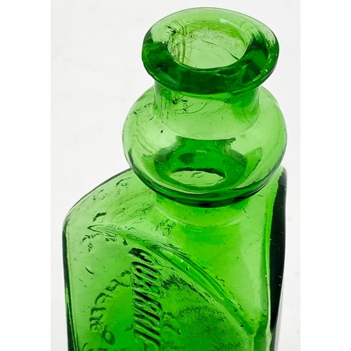 152 - FISHERS SEAWEED EXTRACT BOTTLE. 5.2ins tall. Stunning bright green glass, triangular shape, distinct... 