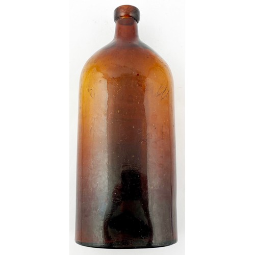 153 - TWO PINT LONDON WARNERS SAFE CURE BOTTLE. 11ins. Mid orange amber. Oval base (inset circular base de... 