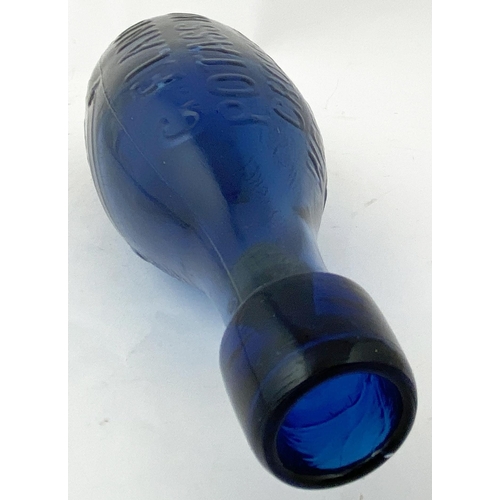 179 - NEWCASTLE BLUE CLASS HAMILTON BOTTLE. (p43 Nothing But the Blues). 9.5ins long. Strong cobalt blue g... 