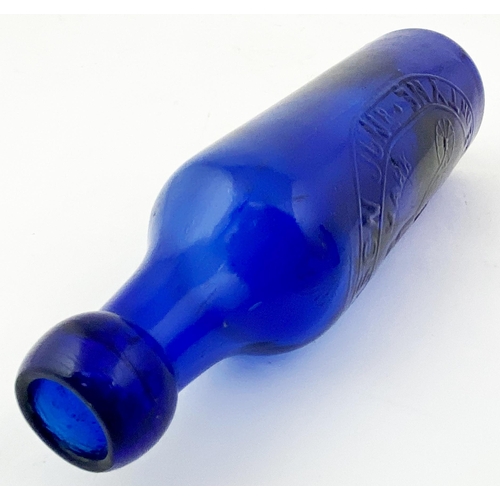 180 - NEWCASTLE BLUE CYLINDER BOTTLE. (p54 Nothing But the Blues). 8.5ins tall. Bright cobalt blue glass u... 