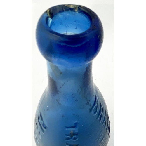 182 - NEWCASTLE BLUE GLASS SKITTLE BOTTLE. (p34 Nothing But the Blues). 7.2ins tall. Upright cobalt blue, ... 