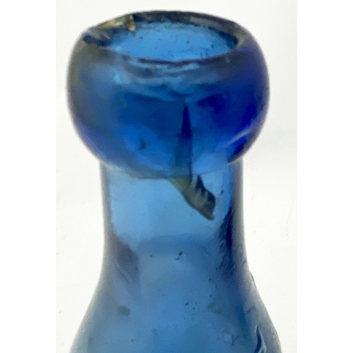 182 - NEWCASTLE BLUE GLASS SKITTLE BOTTLE. (p34 Nothing But the Blues). 7.2ins tall. Upright cobalt blue, ... 