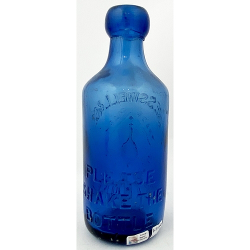 183 - BIRMINGHAM BLUE GLASS GINGER BEER BOTTLE. 6.8ins tall, bright cobalt glass ginger beer bottle shape.... 