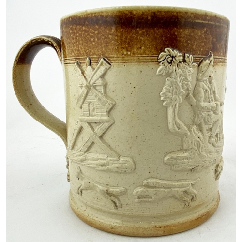 190 - SALT GLAZE TANKARD. 5.8ins tall. T.t. salt glaze tankard, looped side handle - foliate applied botto... 