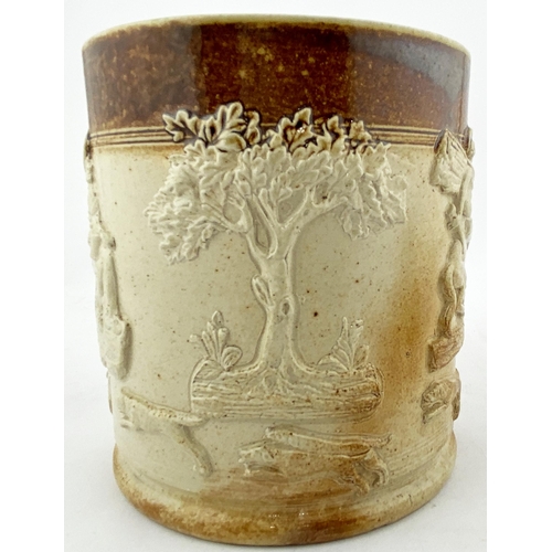 190 - SALT GLAZE TANKARD. 5.8ins tall. T.t. salt glaze tankard, looped side handle - foliate applied botto... 