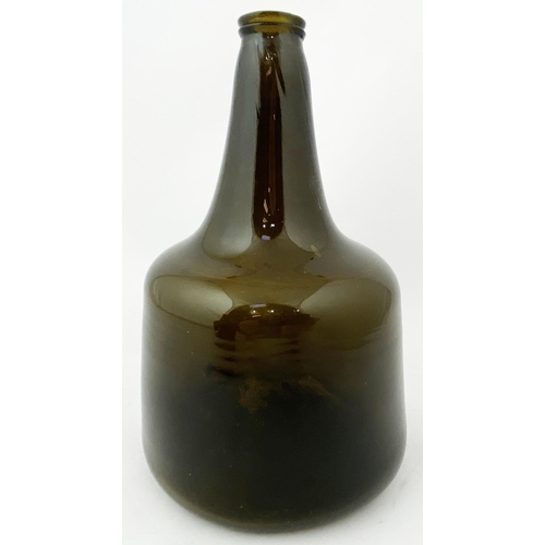 210 - ENGLISH MALLET WINE BOTTLE. 8.2ins tall, dark amber tinged green (?), c. 1725-40, thin double collar... 