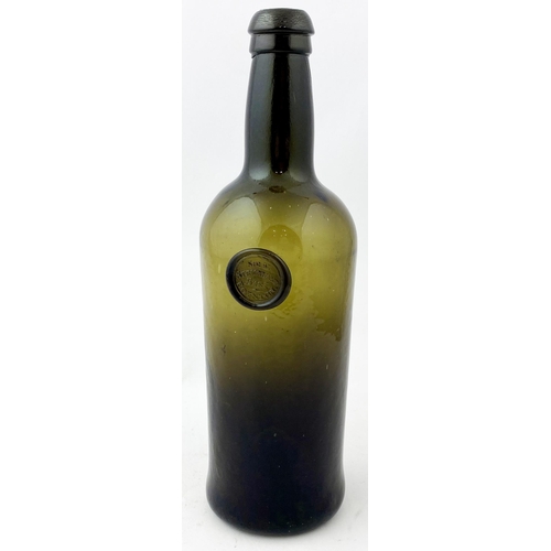 212 - SEALED CYLINDER WINE BOTTLE. 11ins tall. Deep olive green/ black glass, rounded shoulders, double co... 