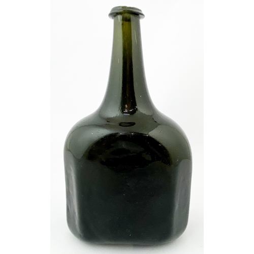 215 - ENGLISH OCTAGONAL WINE BOTTLE. 8.9ins tall, very dark green, virtually true black, glass, c. 1735-45... 