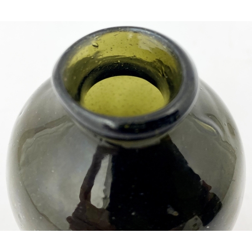 178 - FREEBLOWN UTILITY BOTTLE. 3.6ins tall. Superb squat very small black glass/ dark green form, crudely... 