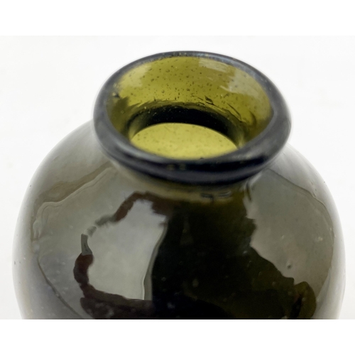 178 - FREEBLOWN UTILITY BOTTLE. 3.6ins tall. Superb squat very small black glass/ dark green form, crudely... 