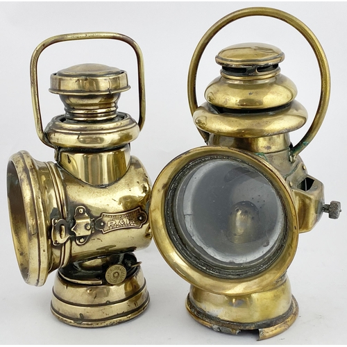 393 - BICYCLE LAMP DUO. 11.5ins tall. Powell & Hanmer Ltd/ Birmingham. Base damage to one. (2)