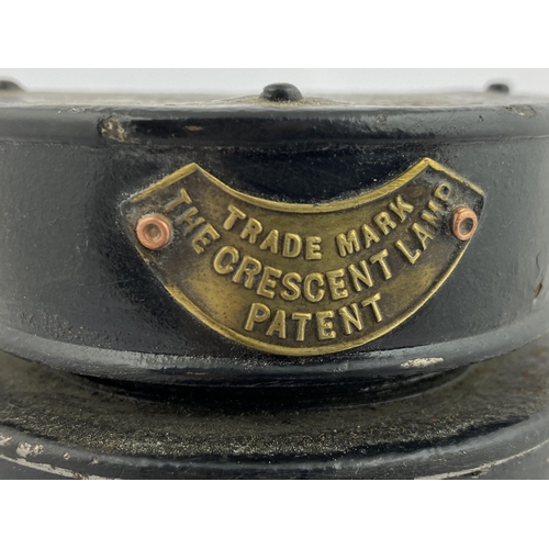 396 - POLICE LAMP plus others. Tallest 10ins. 4 plain plus THE CRESCENT LAMP/ PATENT. Damages. (5)