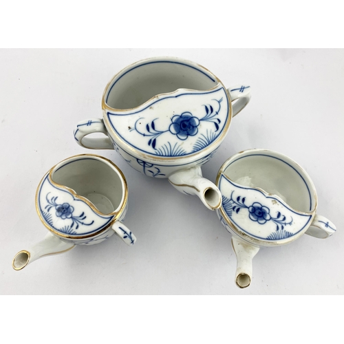 442 - FEEDING CUP TRIO. Largest 6ins. Blue & white porcelain, gold banding, some faded. (3)