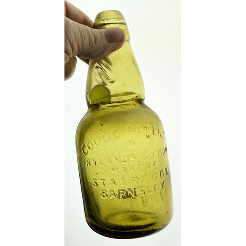 577 - NARROW NECK DUMPY CODD BOTTLE. 7.25ins. Amber, embd CODDS PATENT/ 4/ RYLANDS & CODD/ BARNSLEY. Body... 