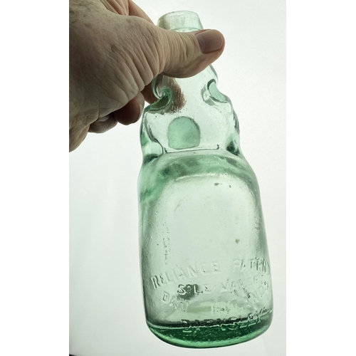 578 - RELIANCE DUMPY CODD BOTTLE. 7.5ins. Aqua glass, embd RELIANCE PATENT/ DAN RYLANDS/ BARNSLEY. Surfac... 