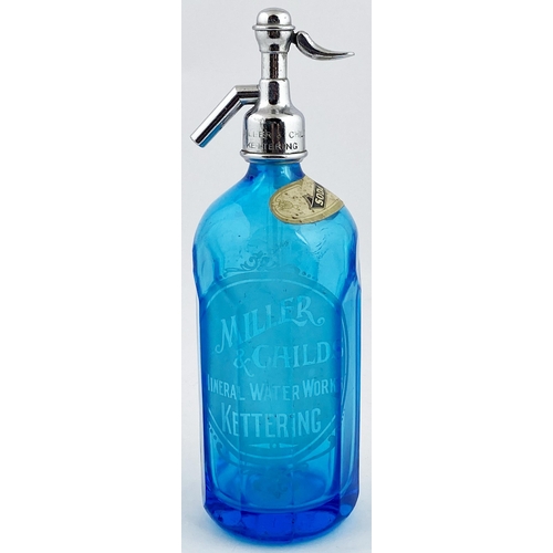 603 - KETTERING SODA SYPHON. 12ins tall. Bright blue glass, acid etched MILLER/ & CHILDS. Paper label & tr... 