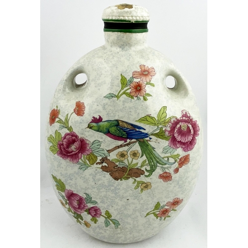 604 - THE MECCA FOOT WARMER. 11.25ins. Multicoloured floral pattern bird to both sides, + stopper. Base p.... 