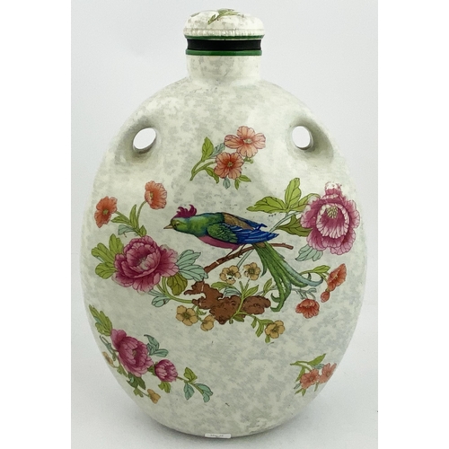 604 - THE MECCA FOOT WARMER. 11.25ins. Multicoloured floral pattern bird to both sides, + stopper. Base p.... 