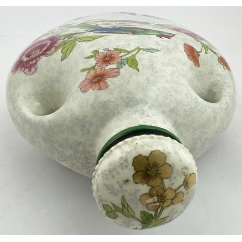 604 - THE MECCA FOOT WARMER. 11.25ins. Multicoloured floral pattern bird to both sides, + stopper. Base p.... 