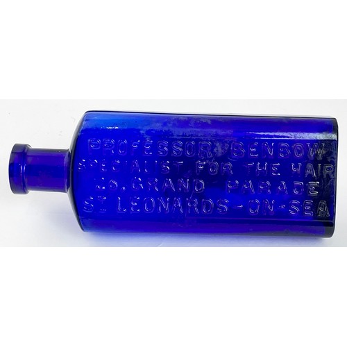 405 - HAIR SPECIALIST BOTTLE. 6ins tall. Cobalt blue, heavily embossed 1 side. PROFESSOR BENBOW/ ST LEONAR... 