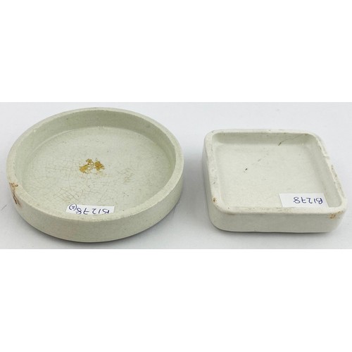 410 - POT LID DUO. Largest 3.5ins. Black & white lids. Burgess Anchovy Paste plus White Rose Tooth Paste. ... 