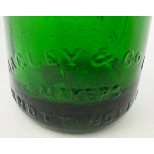 507 - SCARBORO & WHITBY GREEN CODD. 7.5ins tall. Emerald green glass, heavily embossed. Inner lip damage.