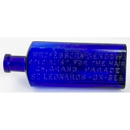 405 - HAIR SPECIALIST BOTTLE. 6ins tall. Cobalt blue, heavily embossed 1 side. PROFESSOR BENBOW/ ST LEONAR... 