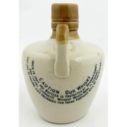 539 - CRUISKEEN LAWN WHISKY JUG. 4.5ins tall. MITCHELLS/ OLD/ IRISH WHISKY/ BELFAST. Directions to rear. B... 