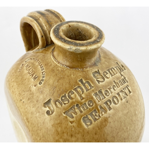 7 - IRISH FLAT SIDED FLAGON. 12.9ins tall. Flat sided t.t. flagon, rear handle, cork lip. Three lines im... 