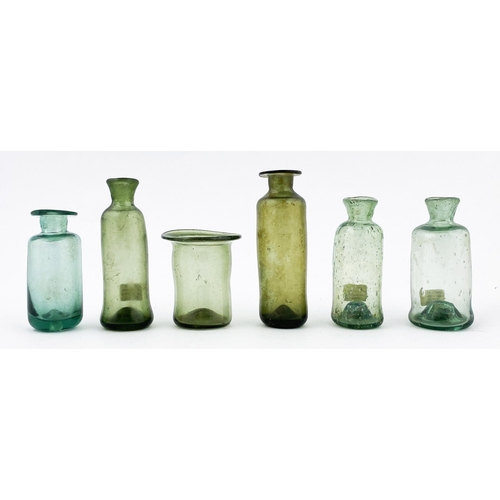 31 - FREE BLOWN APOTHECARY PHIAL. 2.4ins tall, striking aquamarine colour cylindrical phial with large fl... 