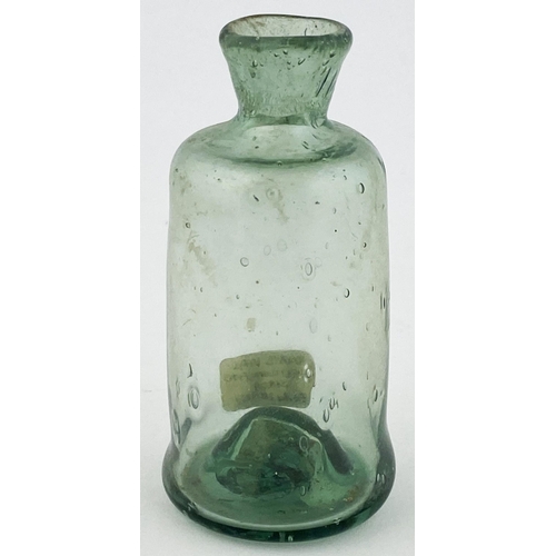 36 - FREE BLOWN APOTHECARY PHIAL. 2.75ins tall small cylinder similar to previous lot but wider bodied, d... 