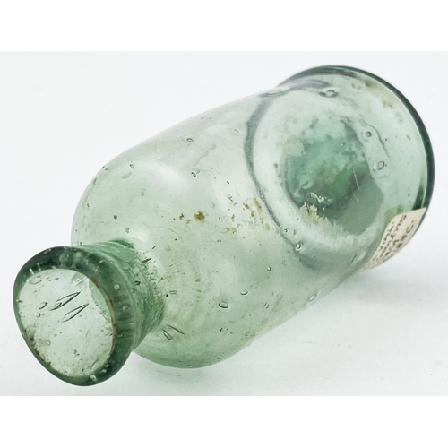 36 - FREE BLOWN APOTHECARY PHIAL. 2.75ins tall small cylinder similar to previous lot but wider bodied, d... 