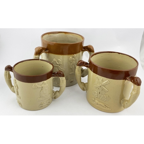 121 - BOURNE DENBY LOVING CUP TRIO, TWO WITH FROG INSERTS. 5.9ins tall, t.t. - red brown top, lower cream/... 