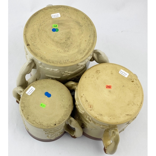 121 - BOURNE DENBY LOVING CUP TRIO, TWO WITH FROG INSERTS. 5.9ins tall, t.t. - red brown top, lower cream/... 