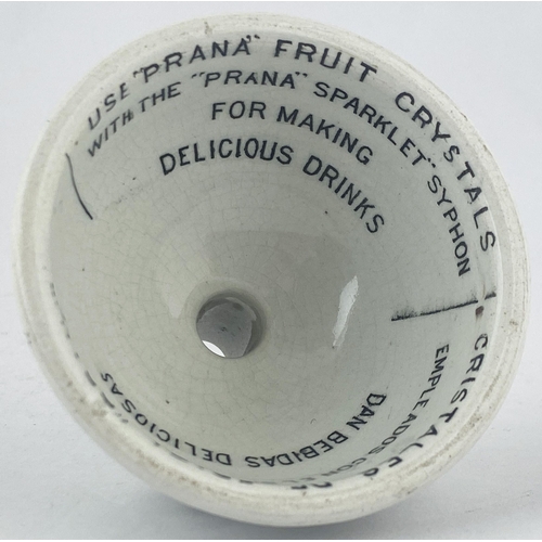175 - PRANA FRUIT CRYSTALS FUNNEL. 2.6ins tall. White glazed funnel (crazing) transferred all round, and i... 