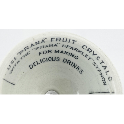 175 - PRANA FRUIT CRYSTALS FUNNEL. 2.6ins tall. White glazed funnel (crazing) transferred all round, and i... 