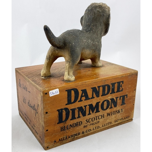 30 - DANDY DINMONT ADVERTISING FIGURE. 9.9ins tall. Composite dog model atop a wooden plinth with adverti... 